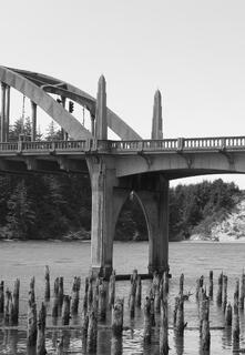 Siuslaw River Bridge in Florence, Oregon, spanning the Siuslaw River with its distinctive arches, historic design, and scenic coastal surroundings.