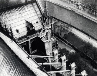 Notre-Dame Cathedral in Paris, France, photographed during the 1940s, showing the historic Gothic cathedral during the World War II era.
