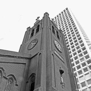 St. Mary’s Cathedral in San Francisco, California, with its distinctive modern architecture and soaring concrete roof rising above the city